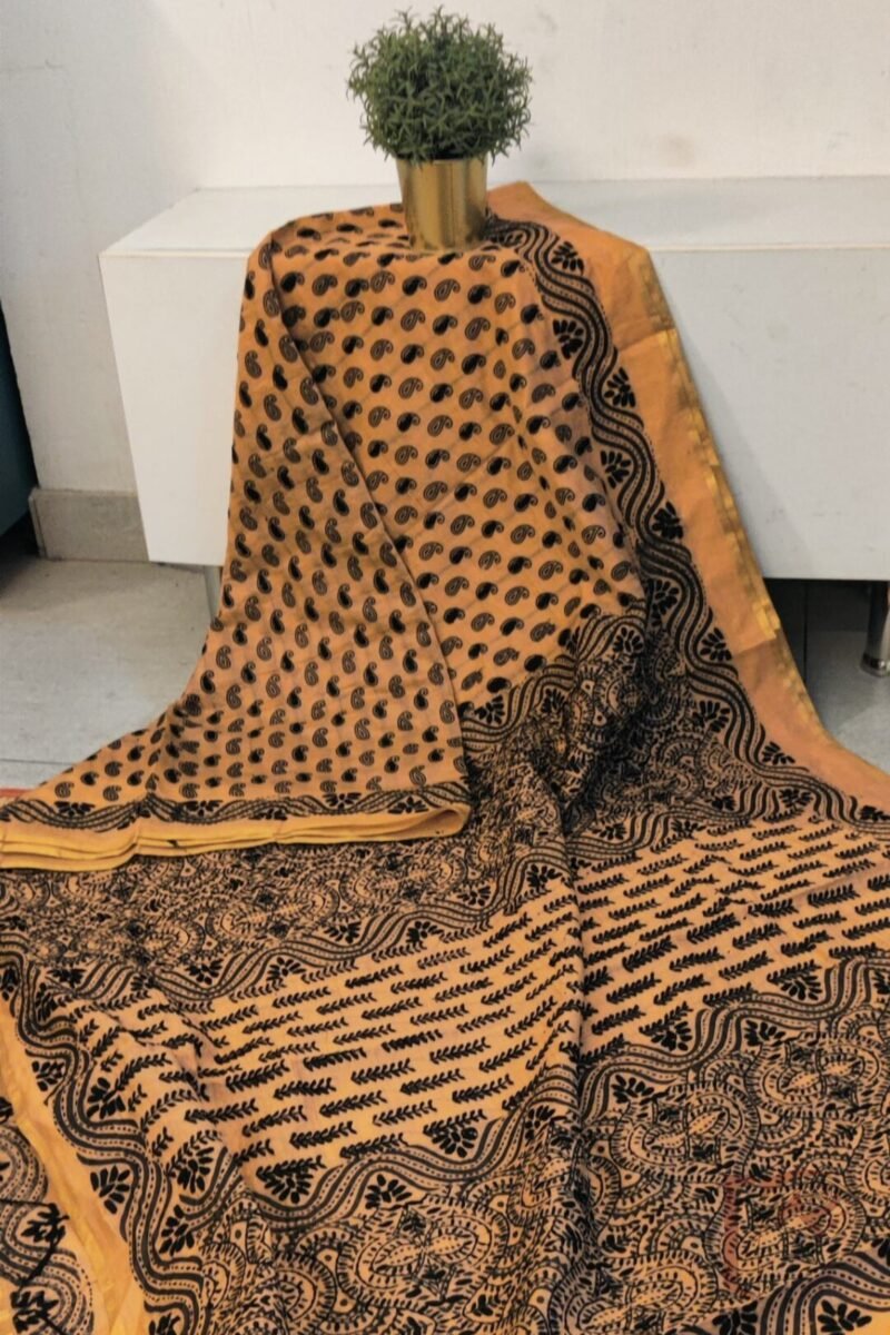 Chanderi Charisma – Light Orange Chanderi Silk Saree with Black Embroidered Mango Motifs and Intricate Printed Pallu