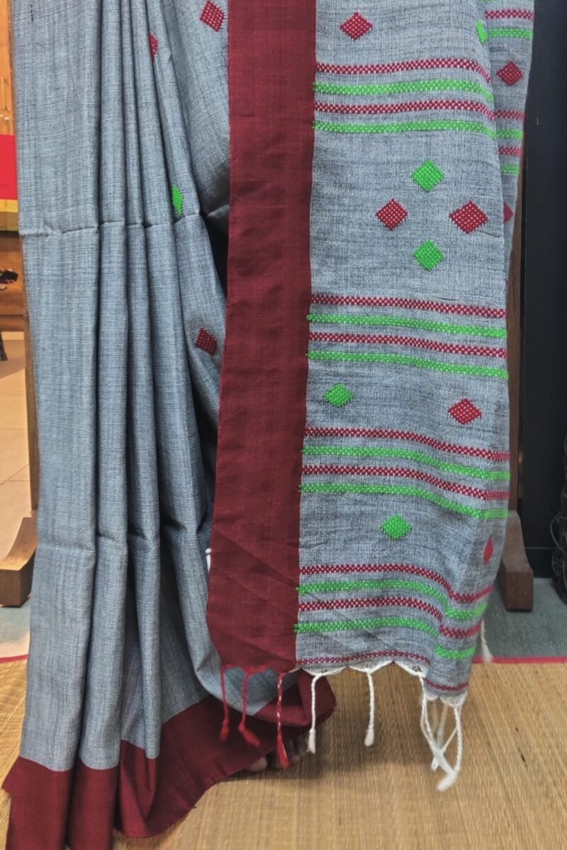 Cotton Chronicles: Dark Grey with Maroon Border and Maroon-Green Motif Assam Cotton Saree - Image 3