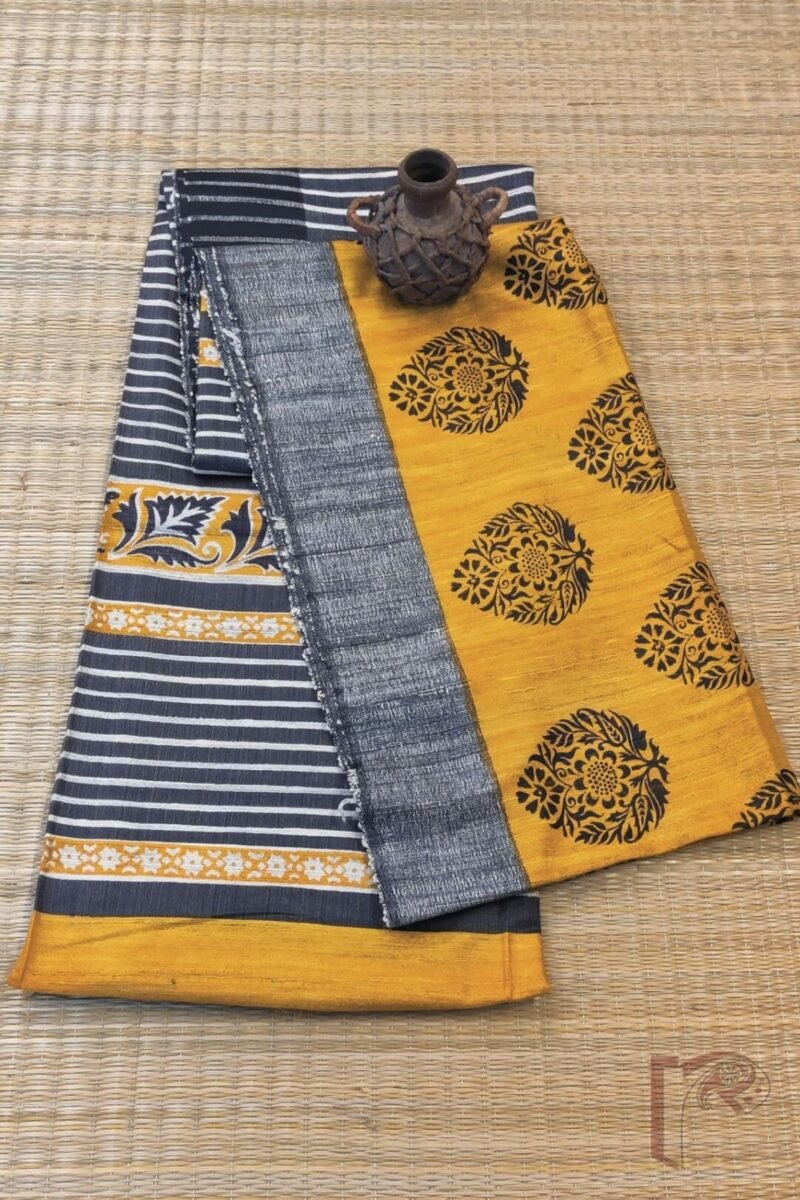 Tussar Tales – Mustard and Black Gicha Tussar Silk Saree with Leaf Block Print and Cream-Black Striped Pallu