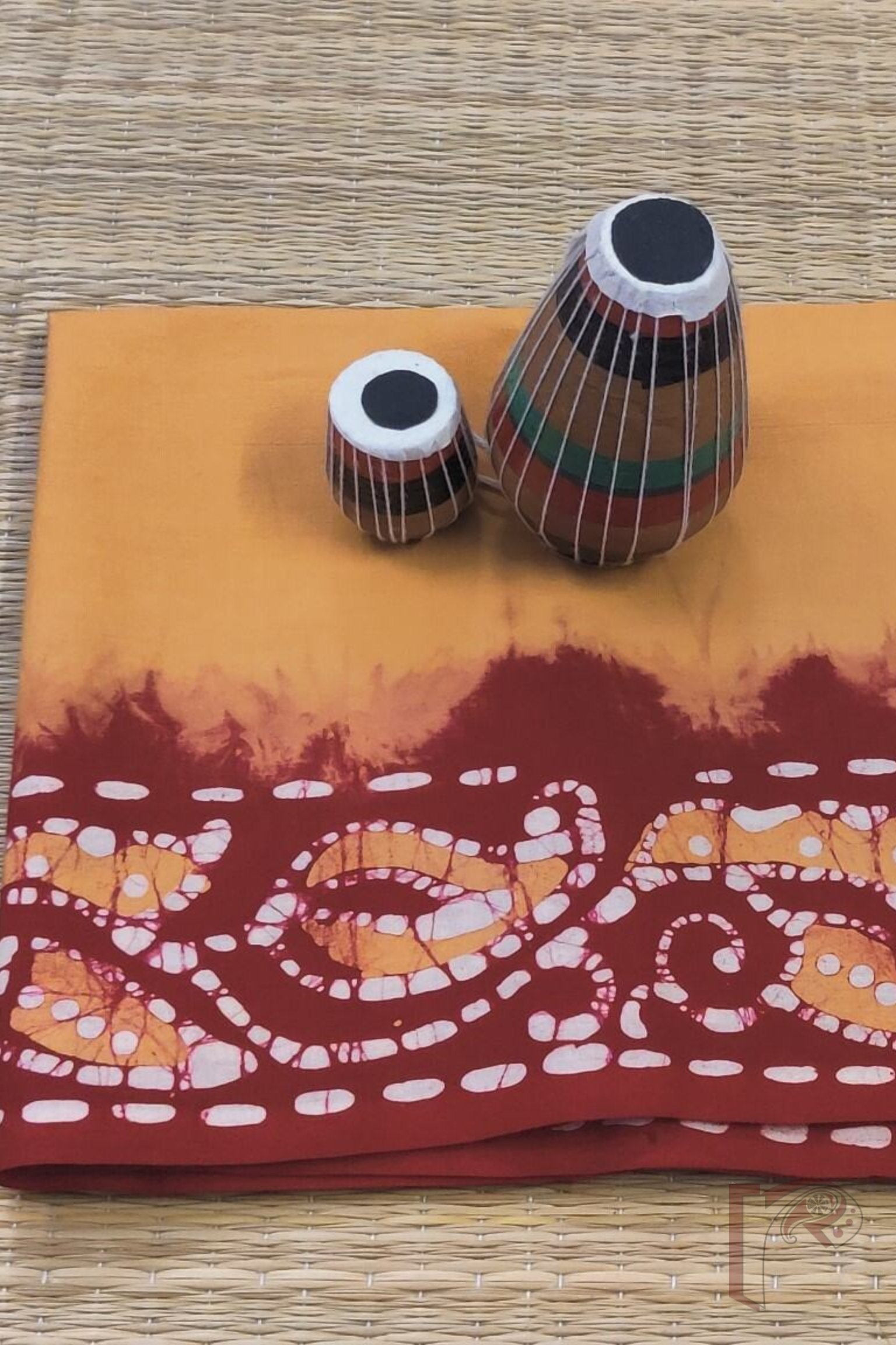 Dull Mustard Mul Cotton Blouse Piece with Red Batik Border and Traditional Motifs in White and Mustard