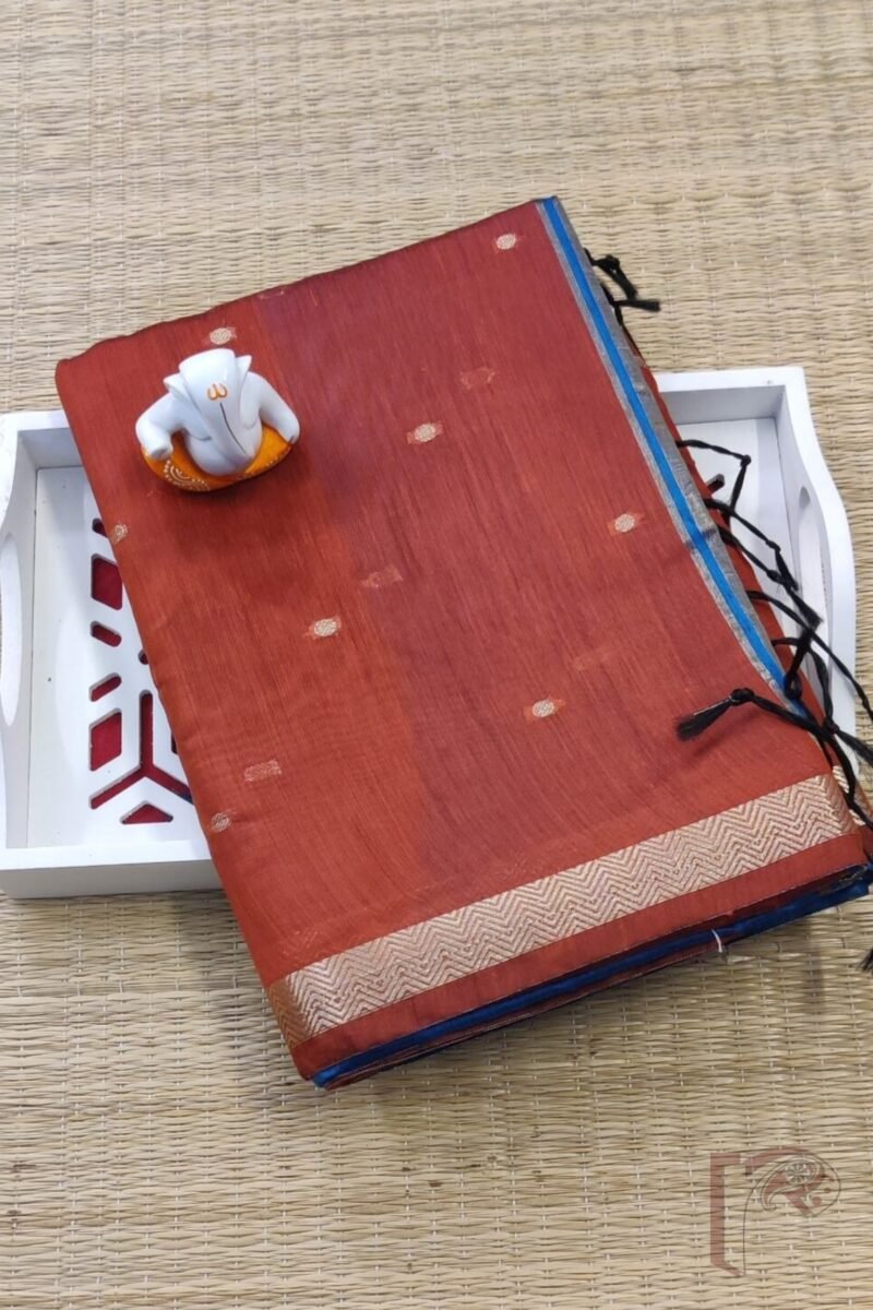 Woven Whispers – Brick Red and Blue Cotton Silk Saree with Zari Buttis and Blue Pallu