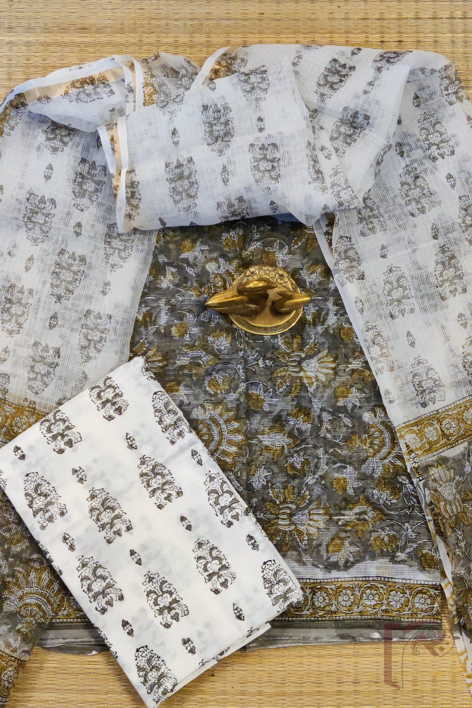 Suit stories – Brownish Grey Ajrakh Motif Kota Cotton Suit Set