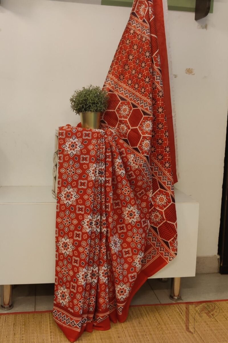 Mulmul Muse – Orange Mulmul Cotton Saree with Ajrakh-Inspired Floral Block Print and Contrasting Pallu