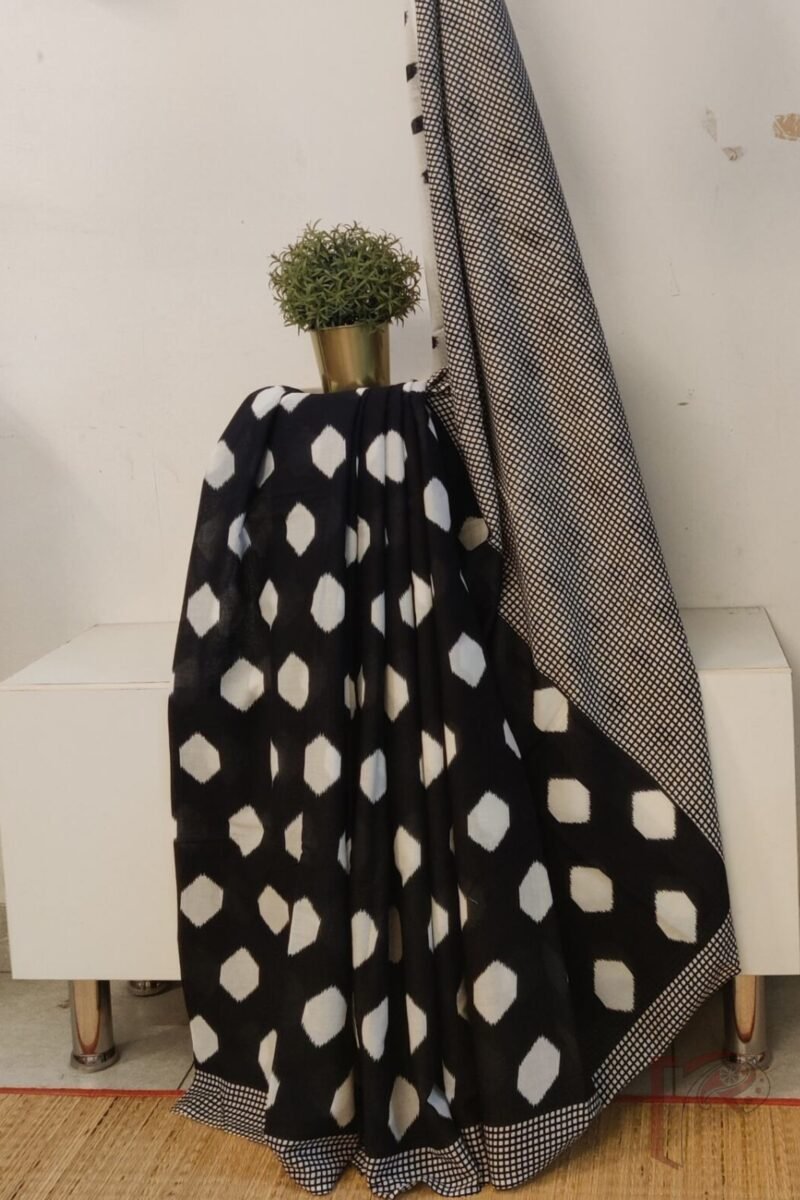 Mulmul Muse – Black Soft Cotton Saree with White Circular Ikat-Inspired Print and Check Borders