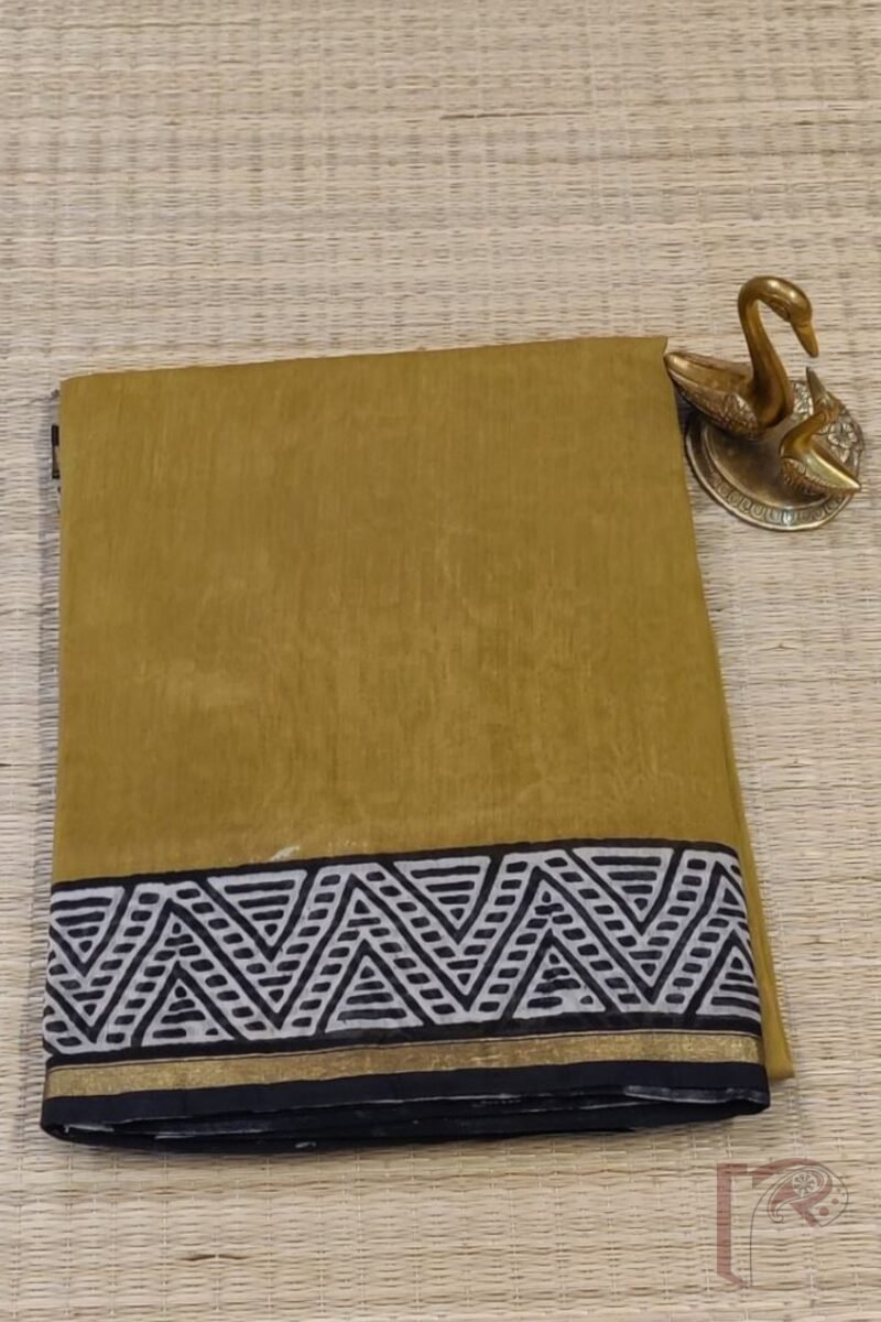 Chanderi Charisma - Mustard Yellow Chanderi Saree with Black Abstract Triangle Border, Blue-Black Printed Pallu, and Cream Floral Blouse - Image 2