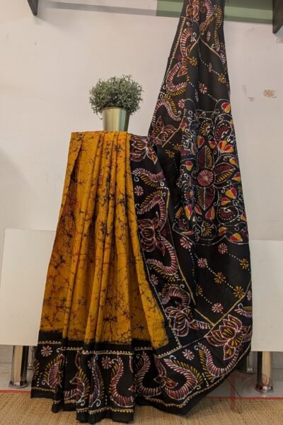 Mulmul Muse – Orange and Black Lotus Print Hand Batik Mulmul Saree