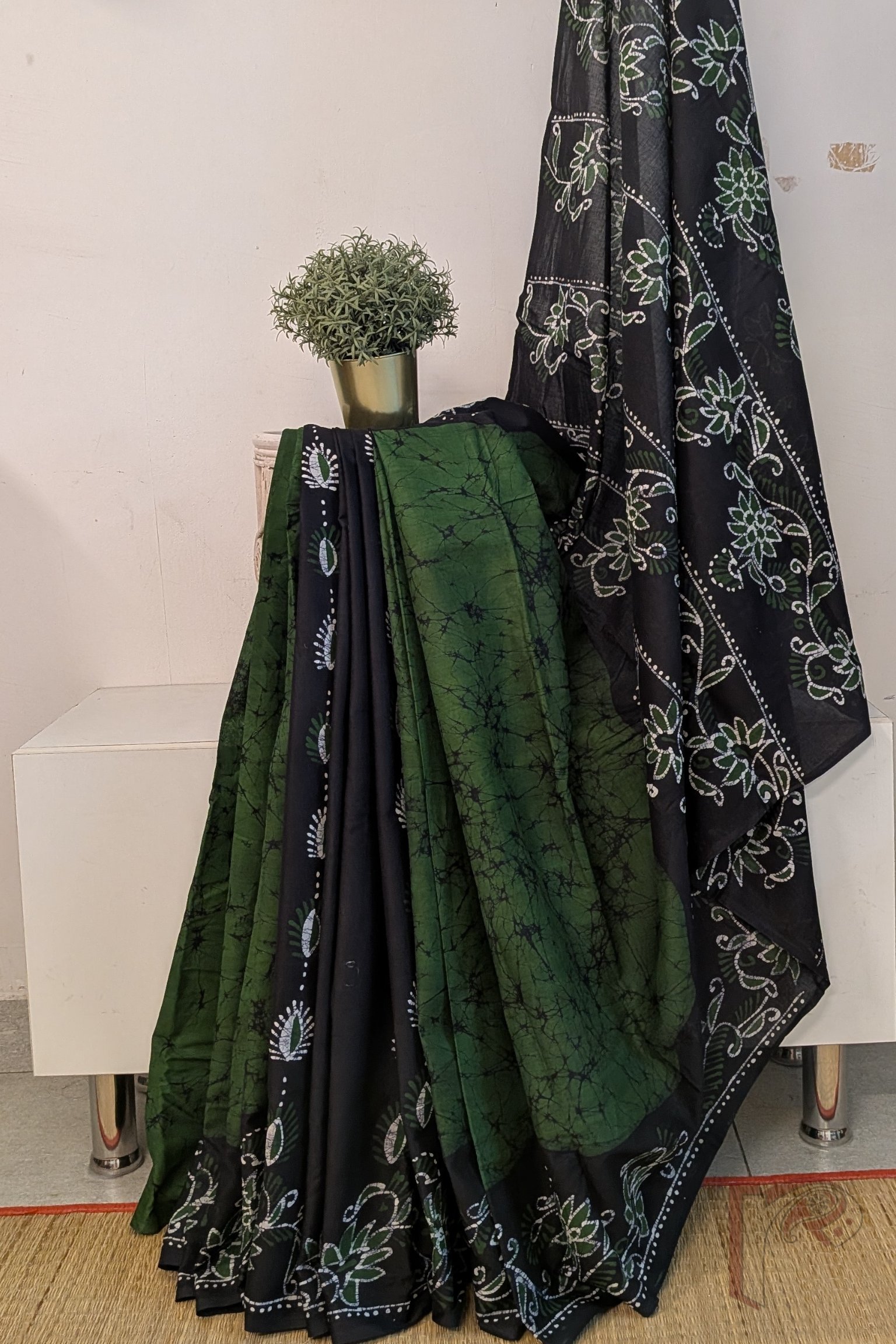 Mulmul Muse – Green and Black Half & Half Hand Batik Mulmul Saree with Floral Motifs