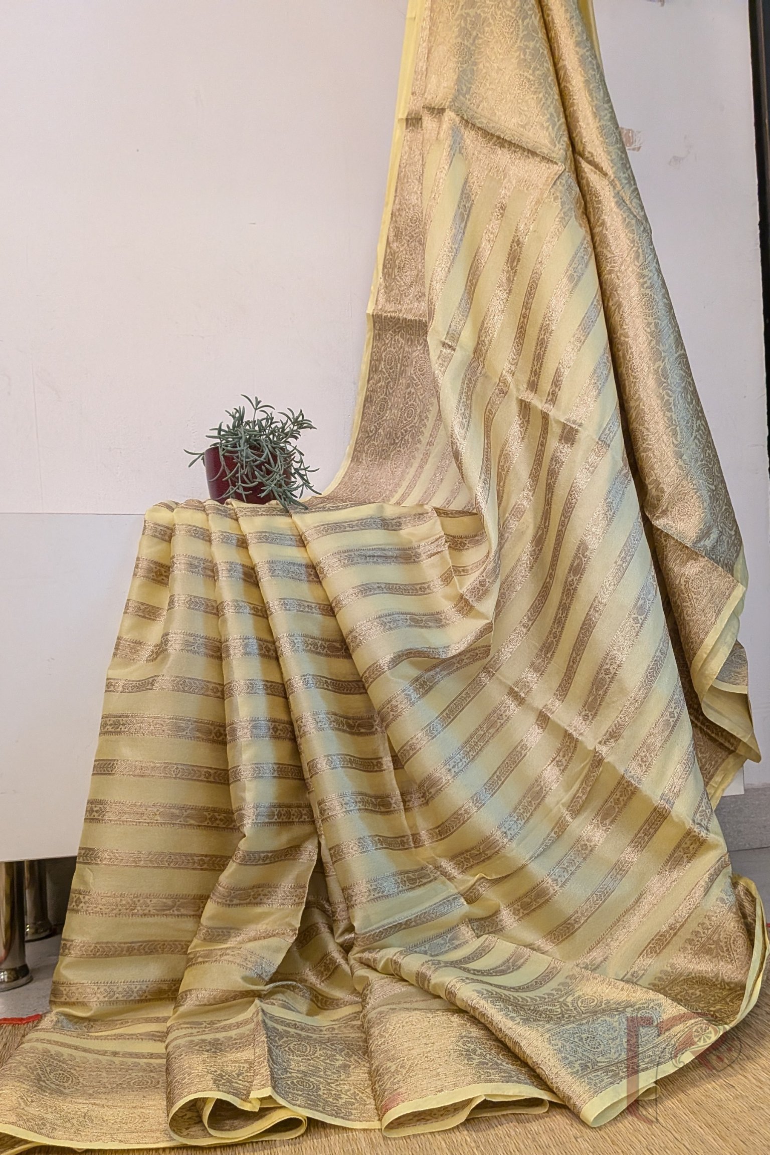 Banarasi Bloom: Light Yellow Khadi Silk Saree with Dull Gold Banarasi Weave and Horizontal Zari Stripe Pattern