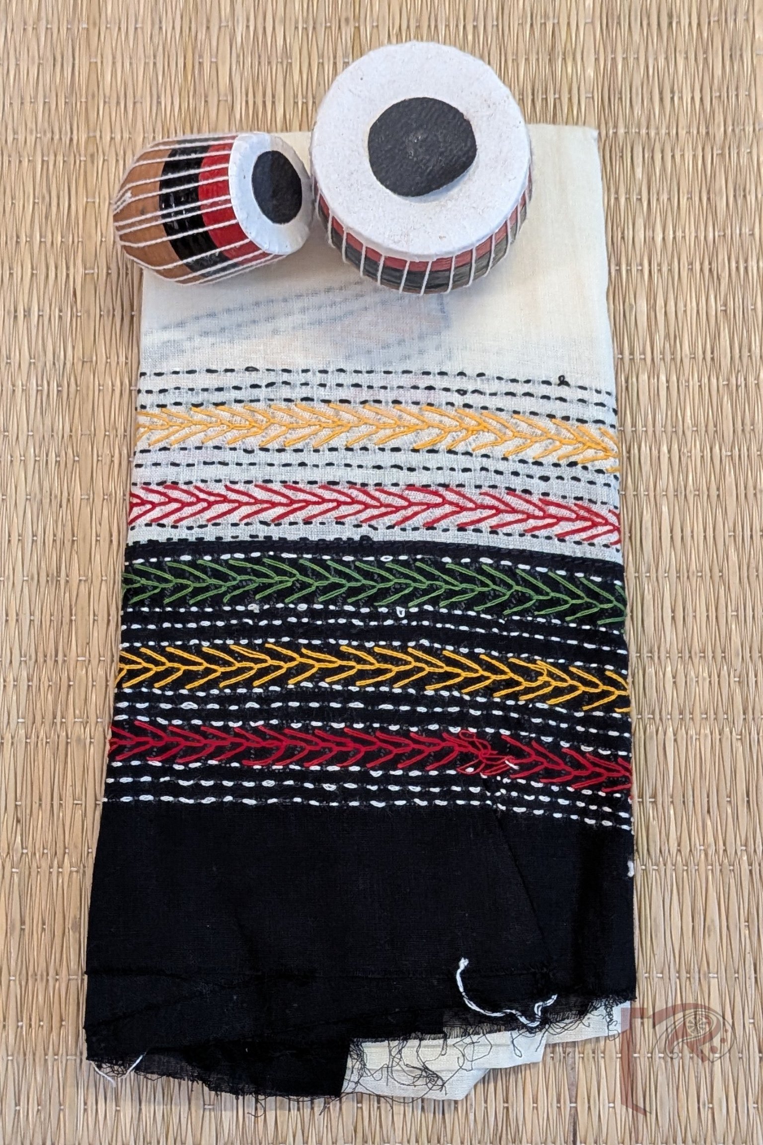 Half White Cotton Unstitched Blouse Piece with Black Attached Border and Multicolour Hand Embroidery