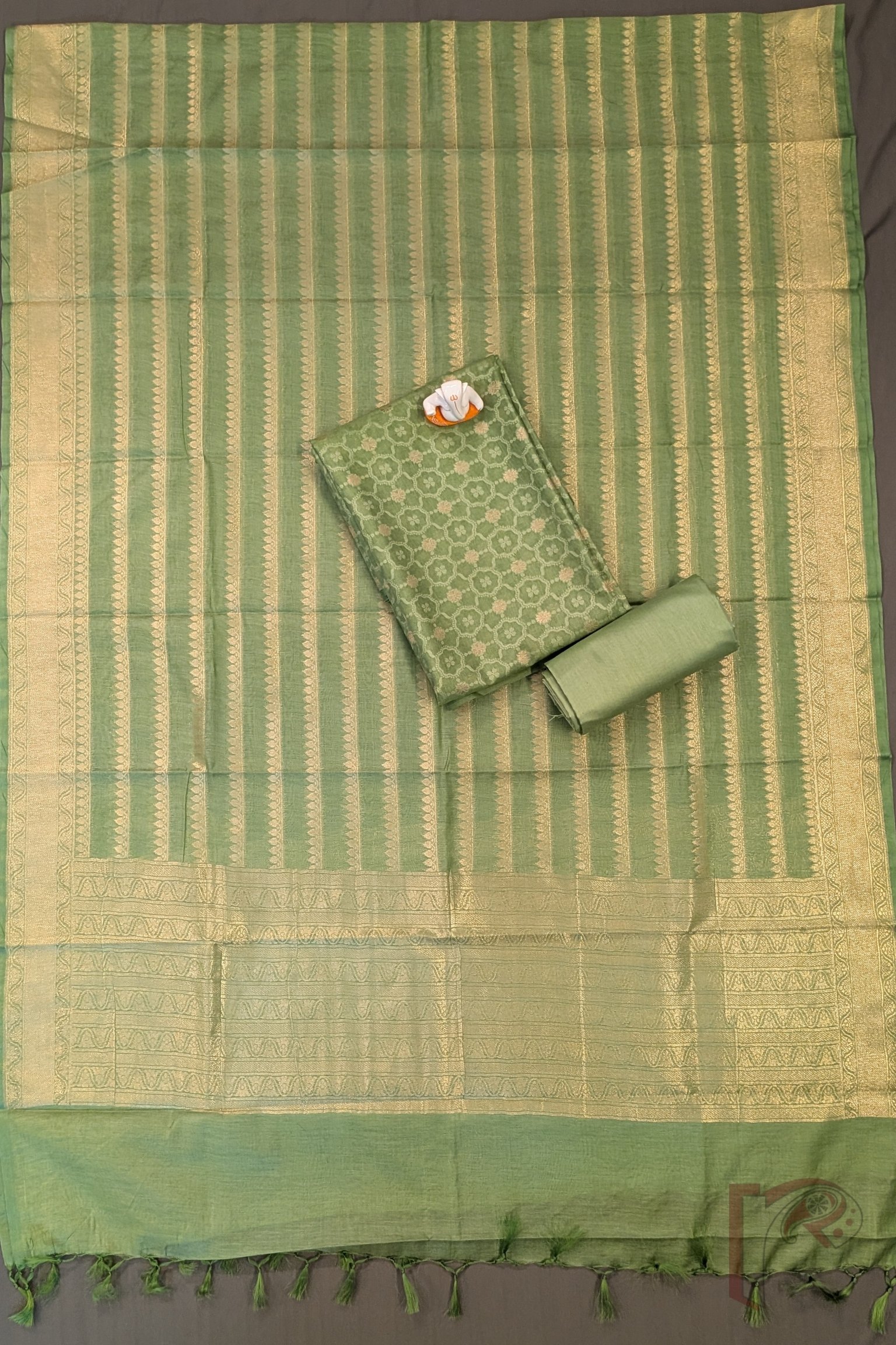 Suit Stories – Leaf Green Cotton Silk Banarasi Suit Material with Honeycomb Weave & Gold Pan-Leaf Line Dupatta