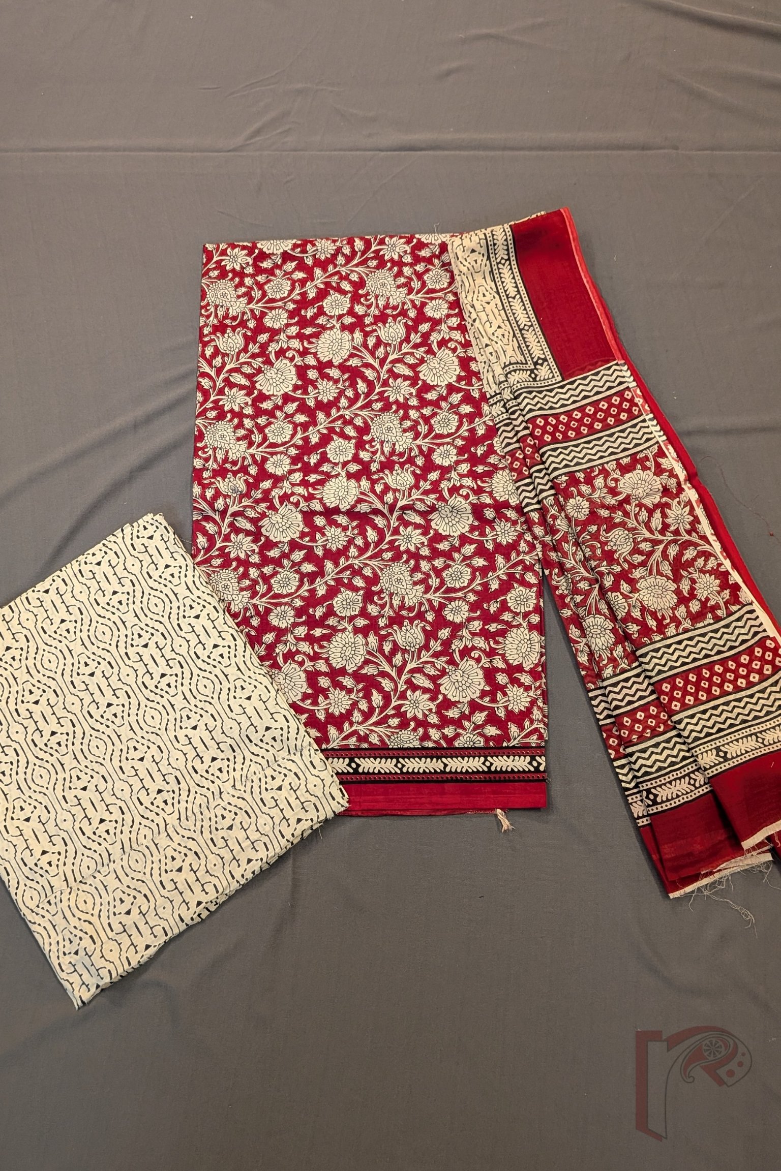 Suit stories - Maroonish Red Kalamkari Floral Mul Cotton Suit Set with Cream & Black Abstract Accents - Image 2