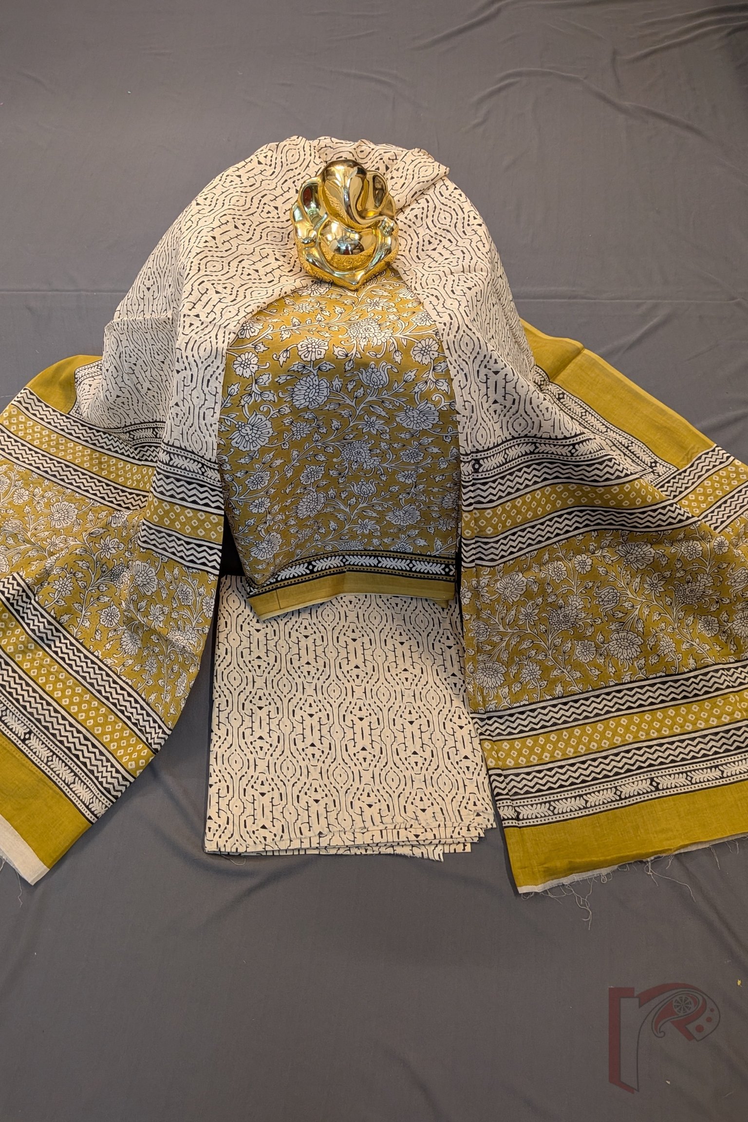 Suit stories - Mustard Yellow Kalamkari Floral Mul Cotton Suit Set with Cream Abstract & Mustard Border