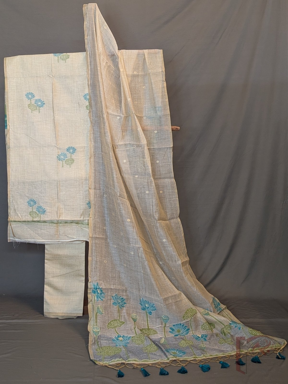 Suit Stories – Beige Cotton Munga Jamdani Suit Set with Blue Green Floral Panel and Embroidered Dupatta