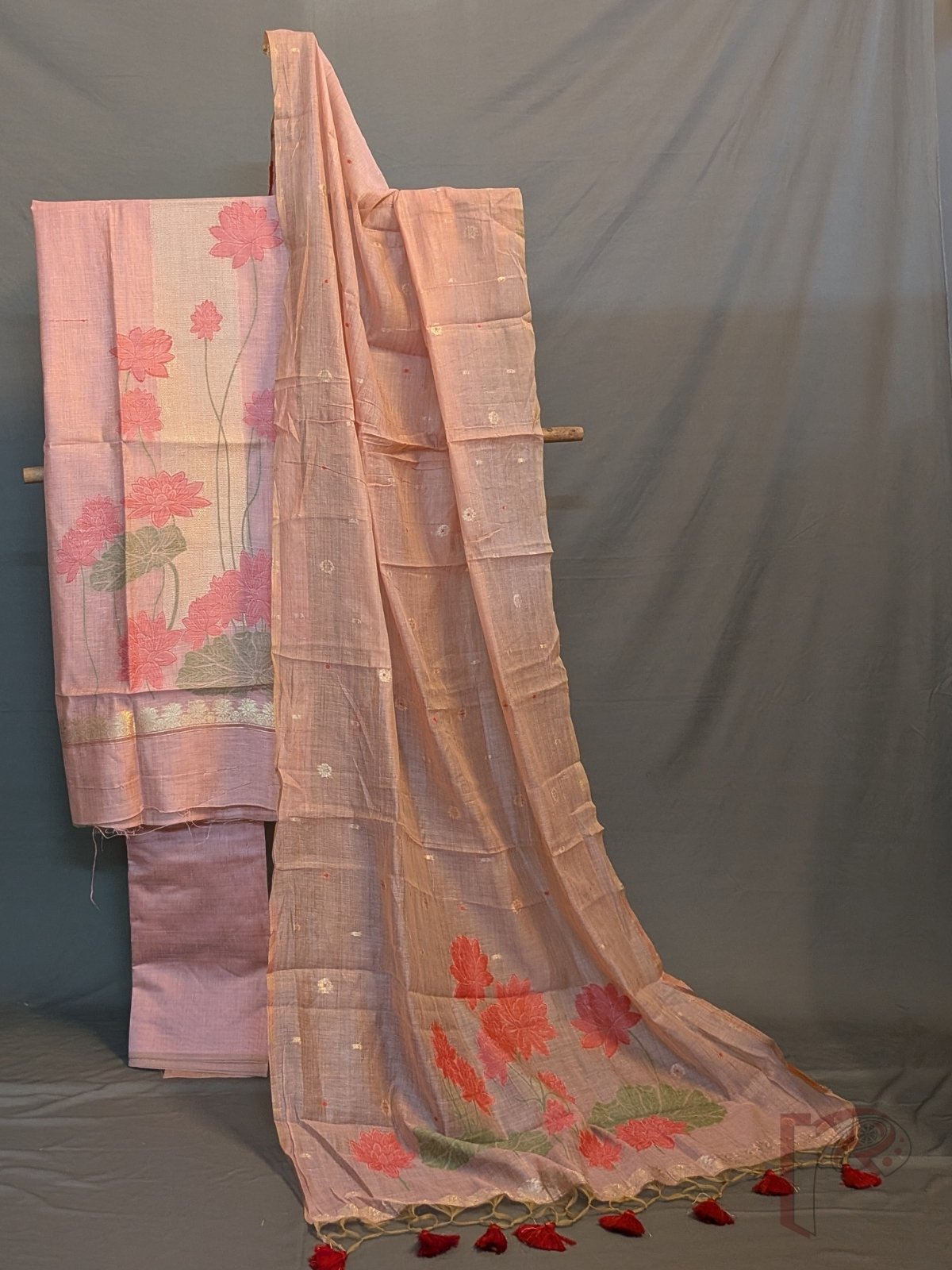 Suit Stories – Onion Pink Cotton Munga Jamdani Suit Set with Lotus Floral Weave and Maroon Tassels