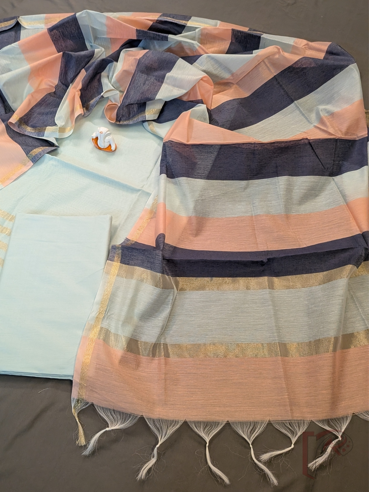 Suit Stories – Light Ocean Blue Suit Material with Parallel Gold Zari Borders - Image 5