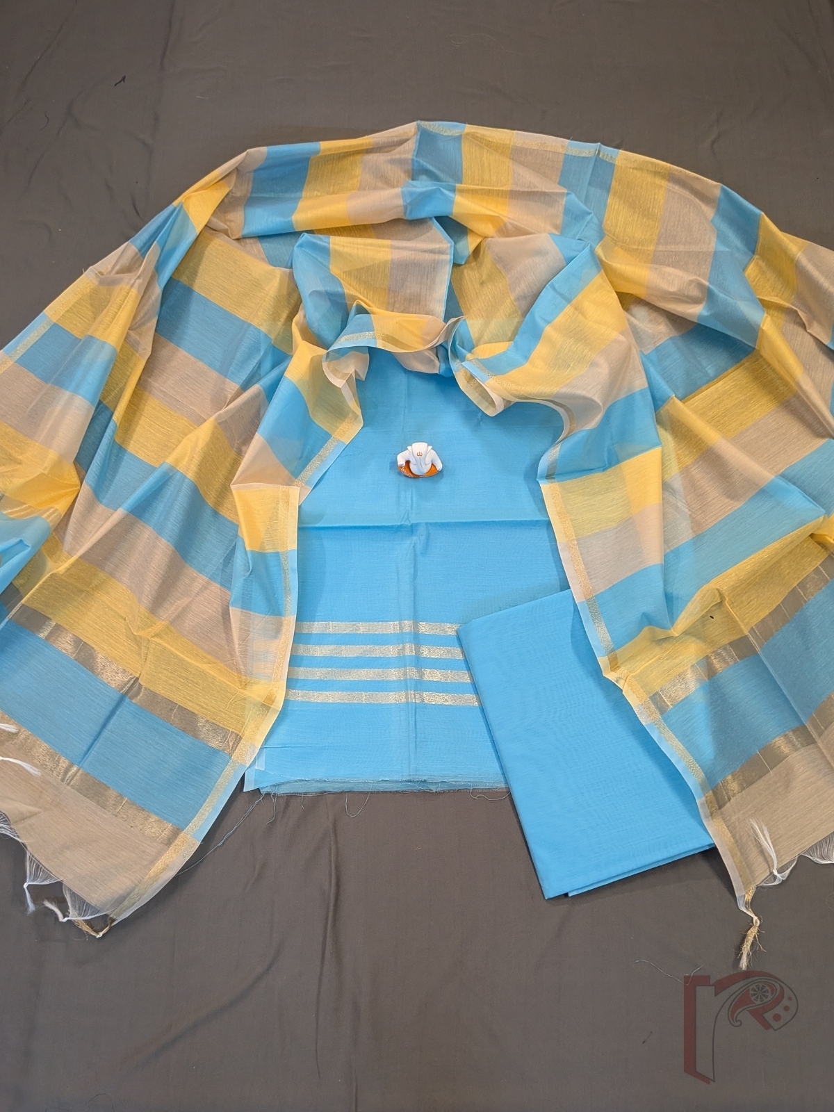 Suit Stories – Sky Blue Suit Material with Gold Zari Border