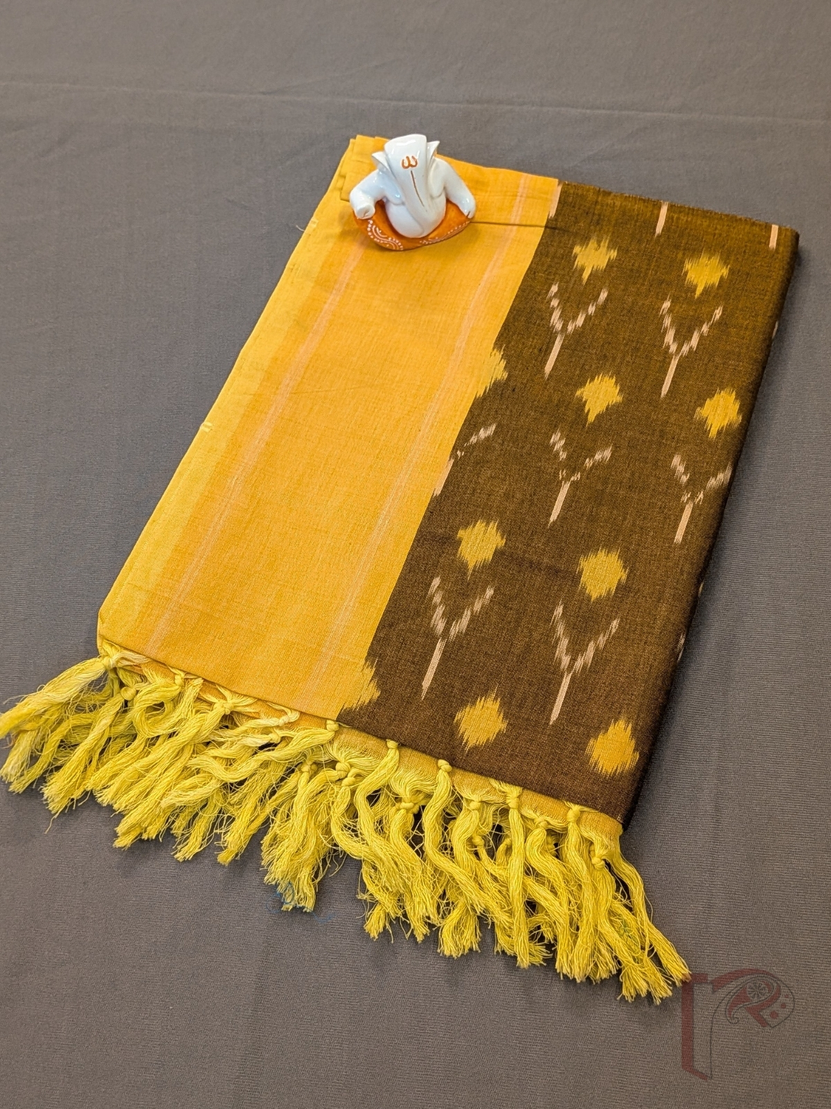 Dreamy Drapes - Brown Mercerized Cotton Ikkat Handloom Dupatta with Yellow Border, Ikkat Motifs & Yellow Tassels - Image 5