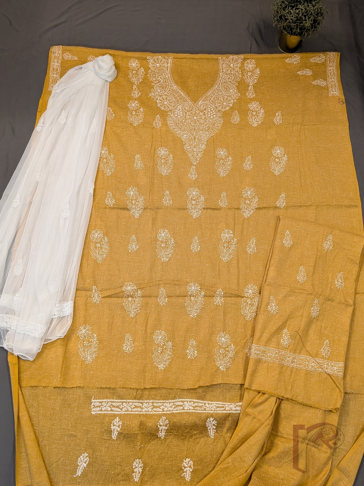 Suit Stories – Mustard Yellow Khadi Cotton Lucknowi Chikankari Unstitched Suit with White Floral and Leaf Embroidery and Chiffon Dupatta
