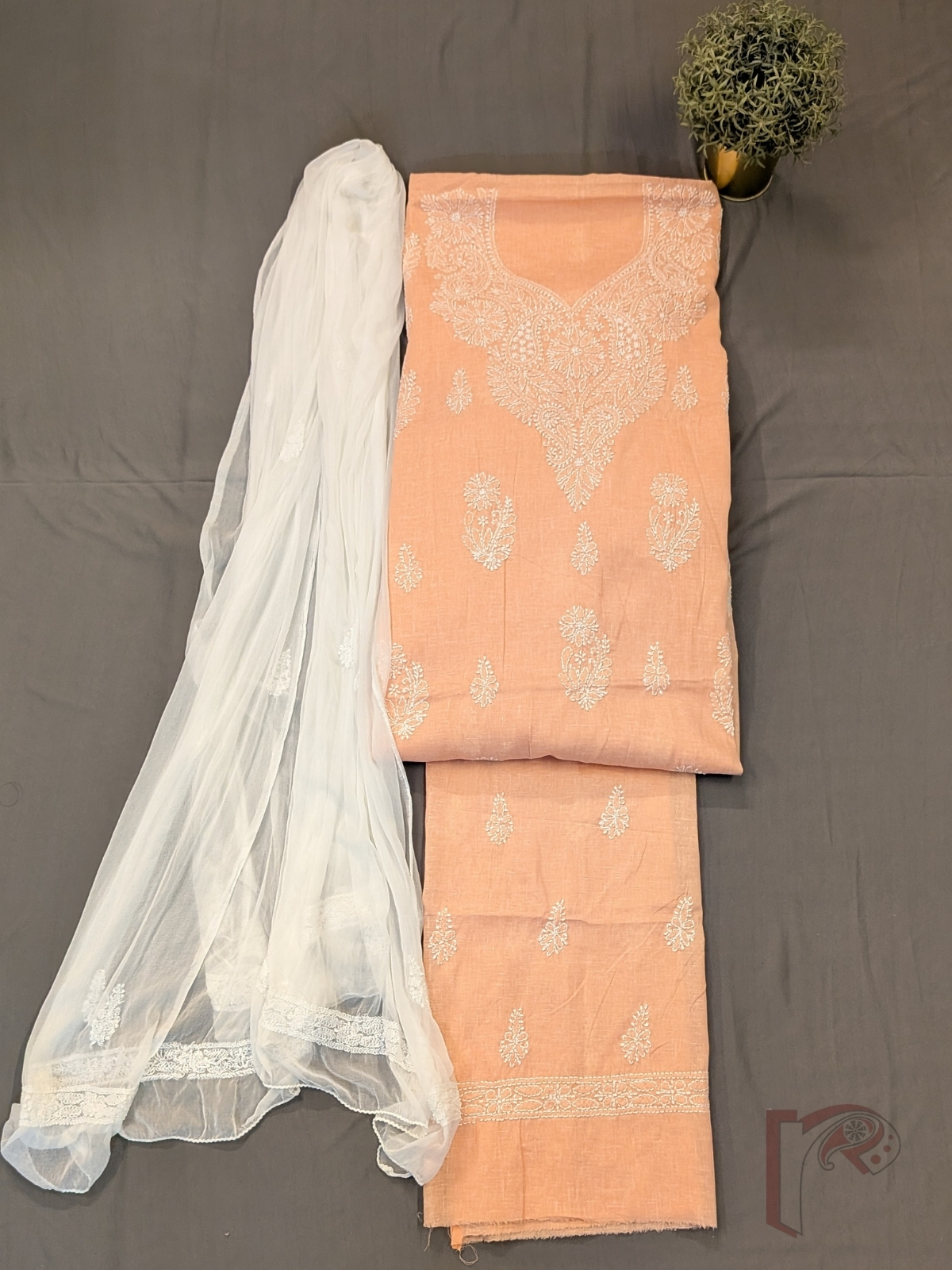 Suit Stories – Light Pastel Orange Khadi Cotton Lucknowi Chikankari Unstitched Suit with White Floral Embroidery and Chiffon Dupatta - Image 2